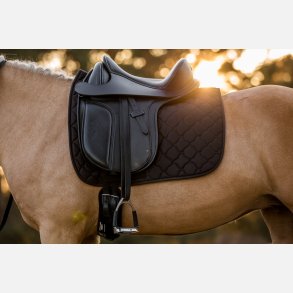 Tidlst sadelunderlag med ndbar underside